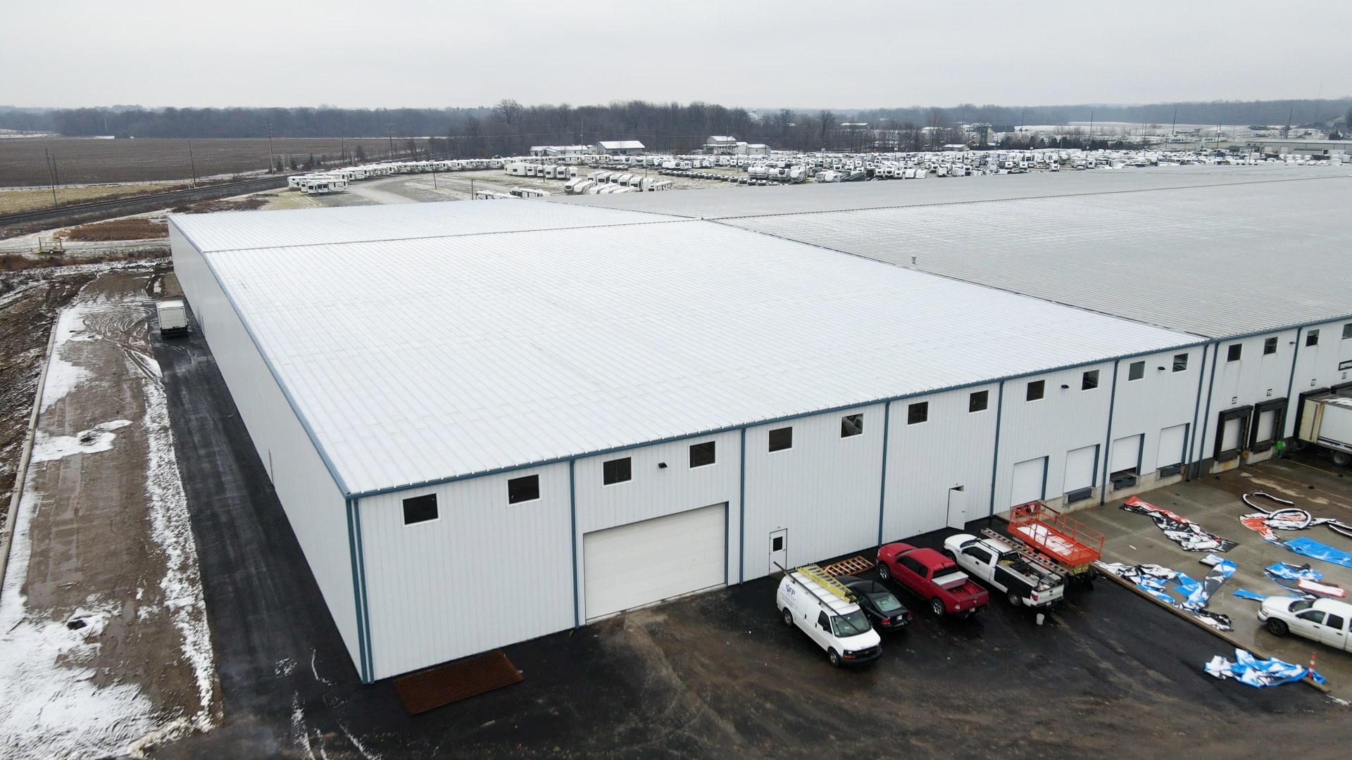 exterior of warehouse addition pre-engineered metal building for Dave Carter & Associates in Goshen Indiana