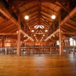 elegant open rafter event center with amish crafted wooden features