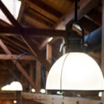 close up of light fixture on amish-crafted wooden structure