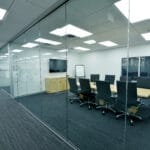 sleek and elegant glass-walled conference room