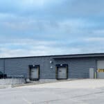 industrial building with two truck docks and two overhead doors