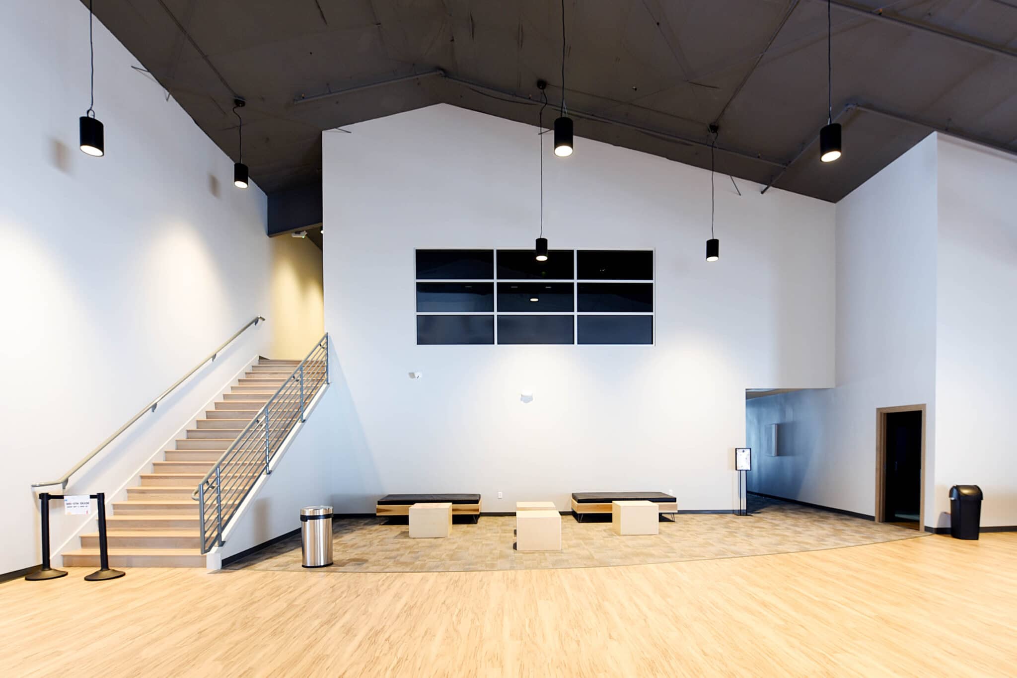 renovated open concept minimalist church lobby