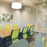 elegant compact bank conference room with glass walls