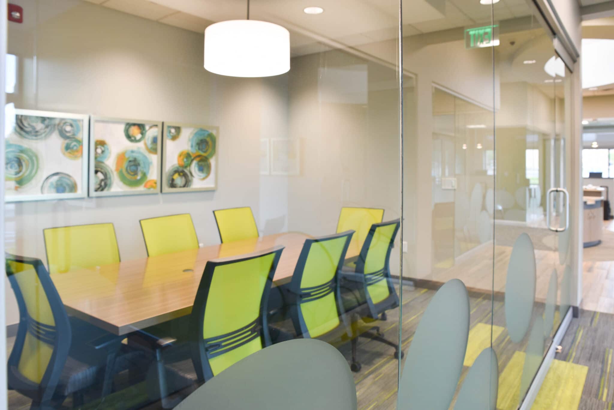 elegant compact bank conference room with glass walls