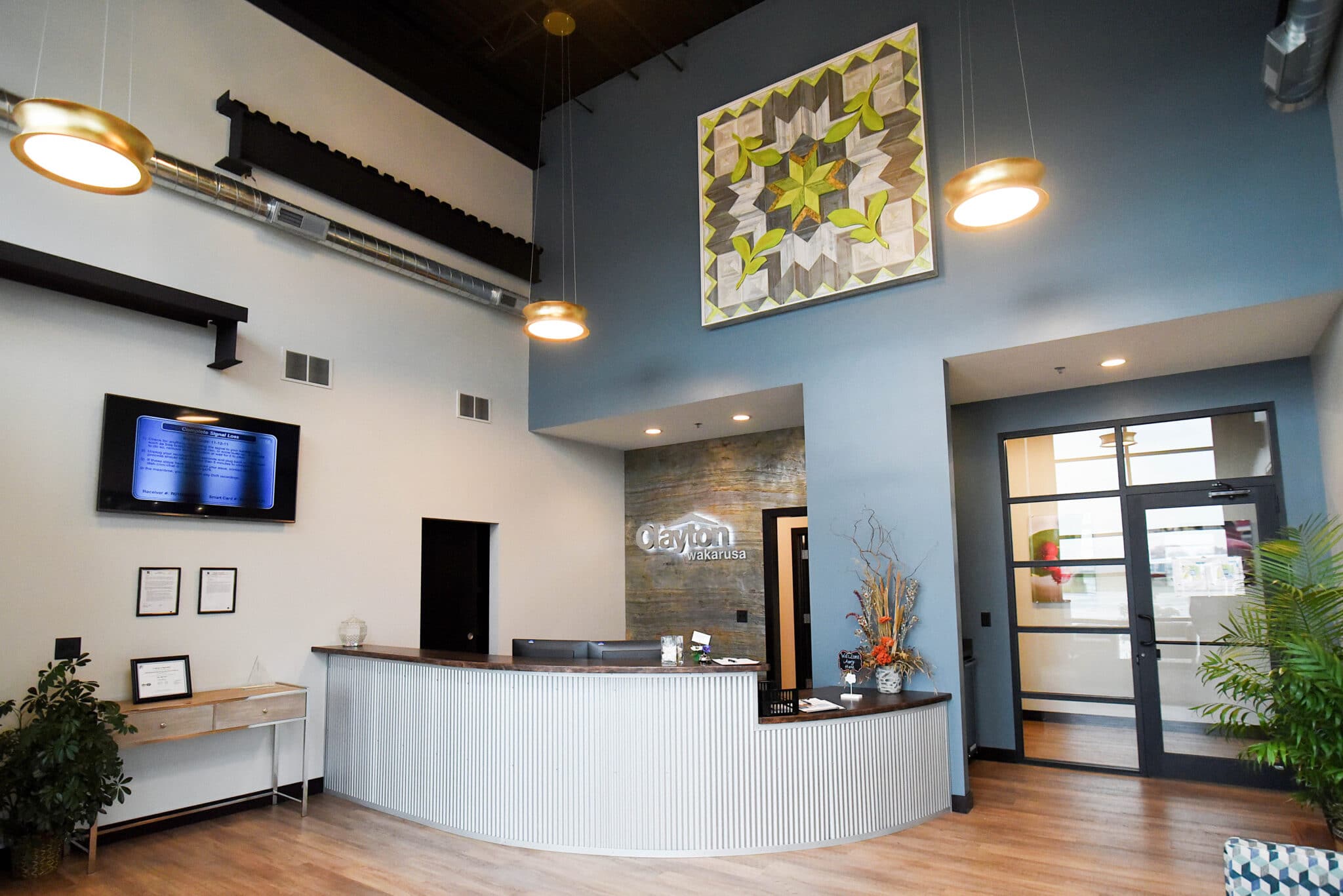 interior shot of remodeled Clayton Homes lobby and front desk