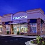 exterior shot of renovated Aspen Dental building at dusk