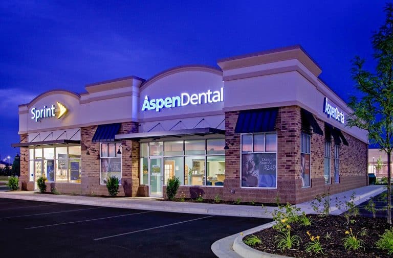 exterior shot of renovated Aspen Dental building at dusk