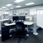 open concept office space with large cubicles