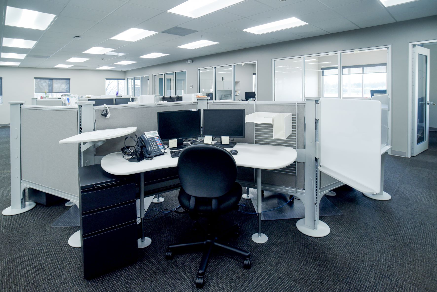 open concept office space with large cubicles