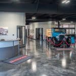 Whiteford Kenworth showroom with welcome desk and old delivery truck on display